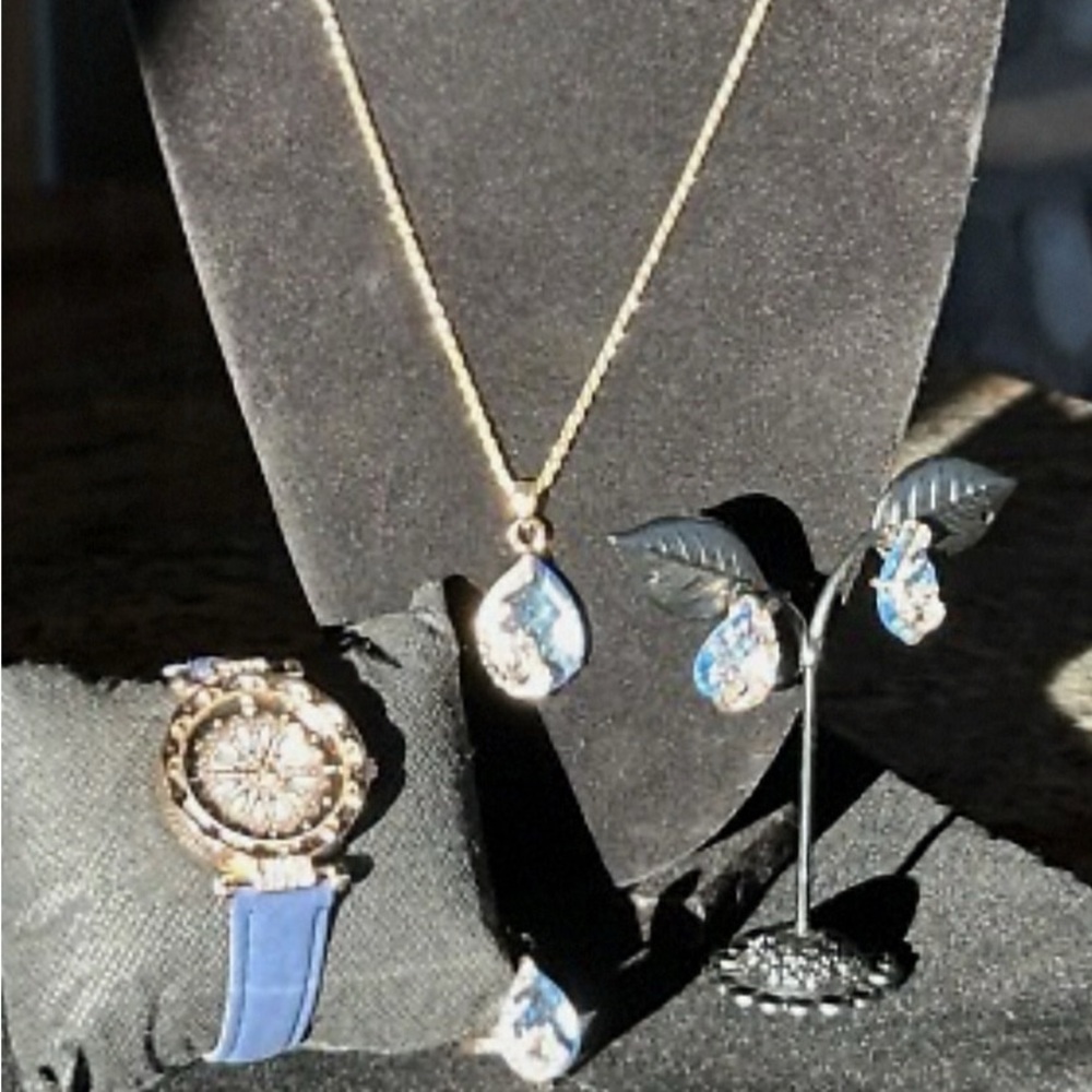 Gold Teardrop Pendant Necklace with Blue Crystal Accents